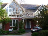 Better than Green Power: installing a solar system yourself. Photo credit: NREL