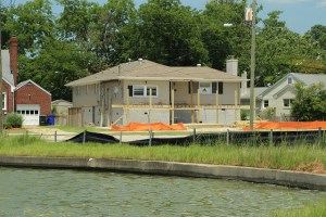 A house in the process of being elevated, a very expensive solution to the problem of recurrent flooding due to sea level rise in Virginia. Photo credit: CCAN