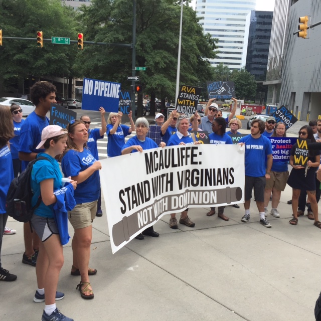 Protesters at an anti-pipeline rally aim their message at Governor McAuliffe