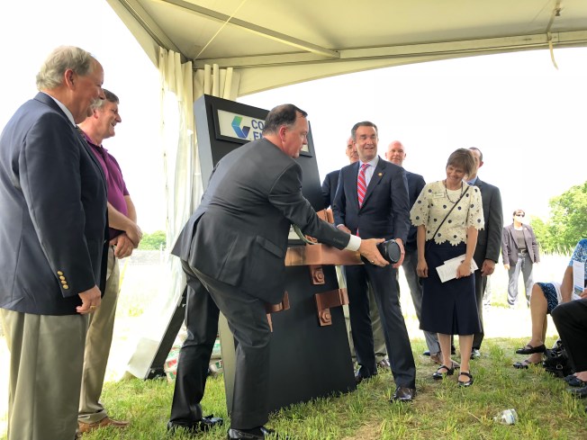 CVEC CEO Gary Wood and Virginia Governor Ralph Northam flip the switch on the solar farm