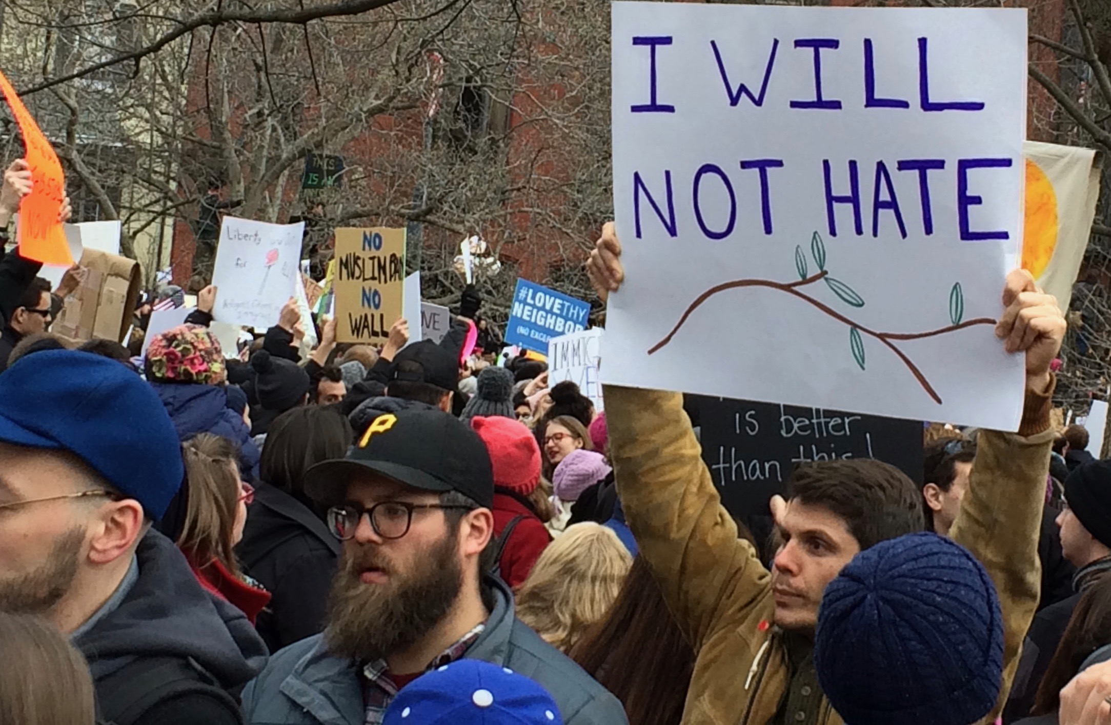 people protesting with a sign