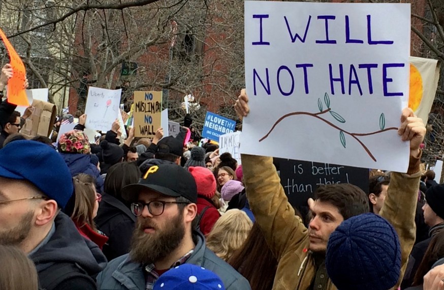 people protesting with a sign