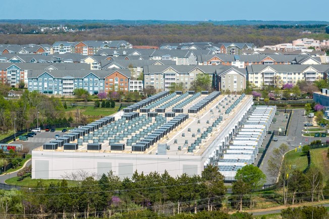 Data center between housing community and a bike path